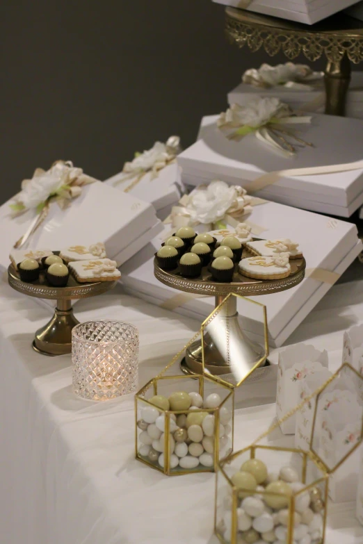 a table topped with lots of different types of desserts