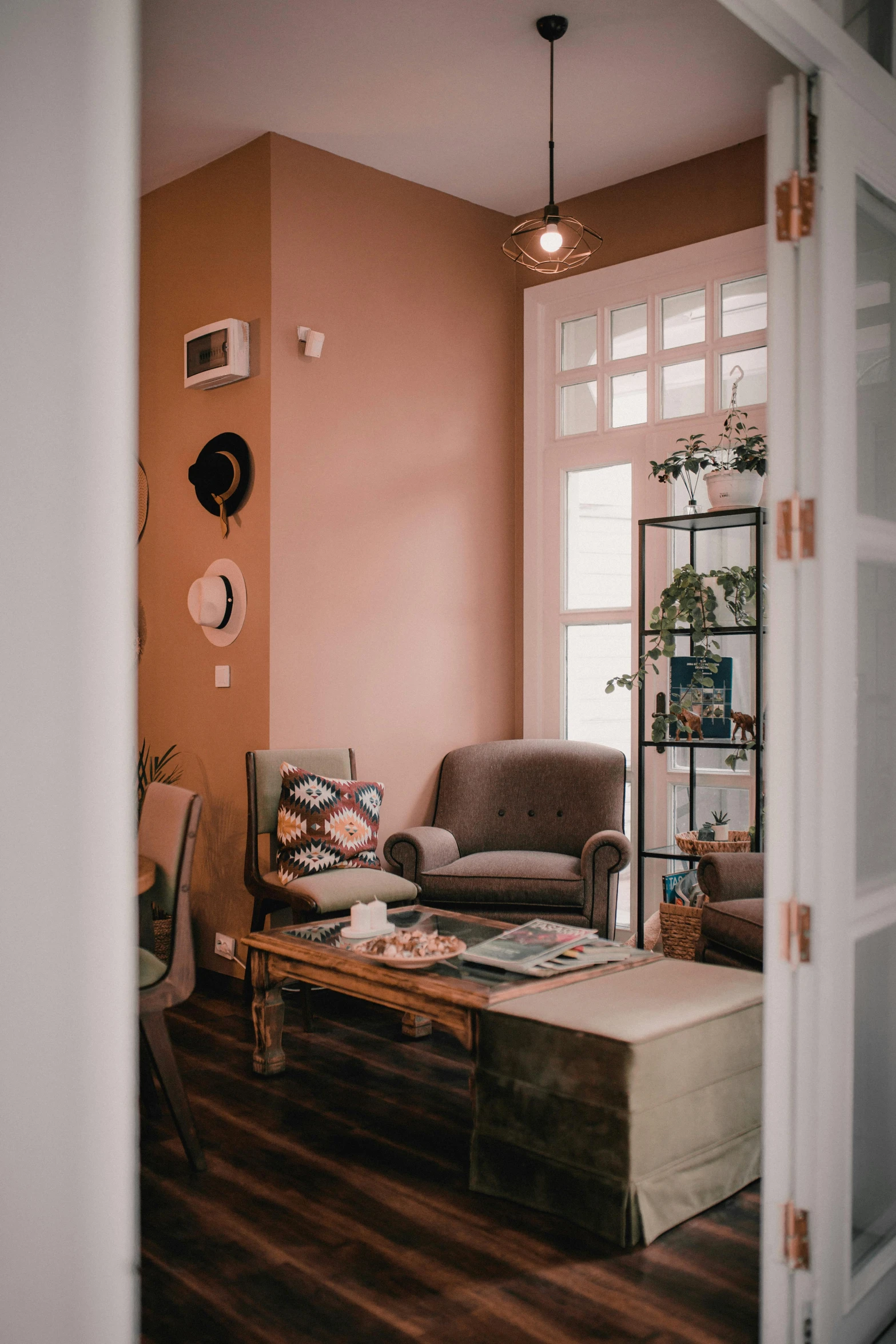 a living room is shown with wood floors