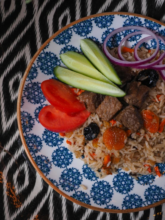 an asian style food dish on a floral plate