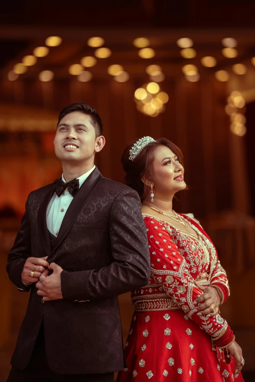 the newlywed couple pose for their wedding portraits