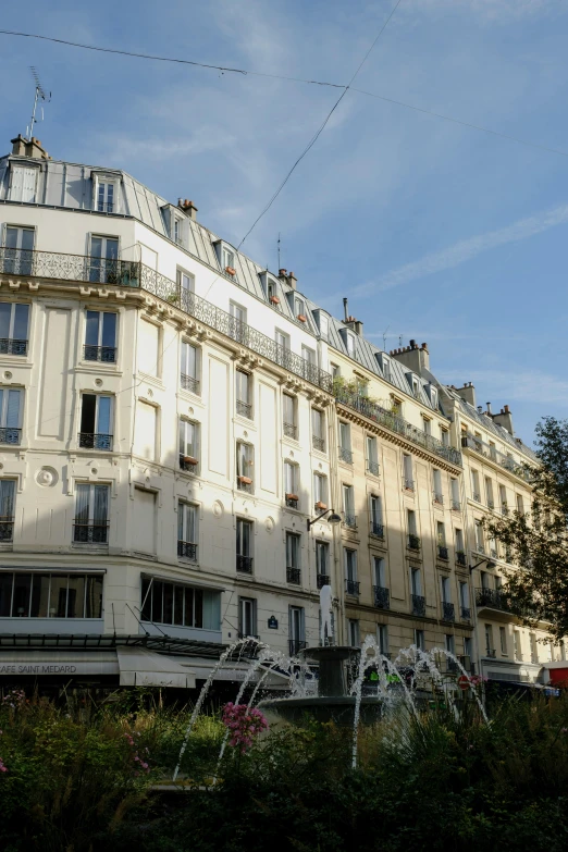 the building has multiple windows and is white