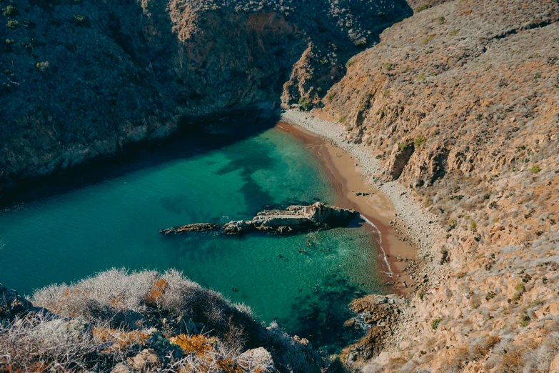 view of a body of water between two mountains