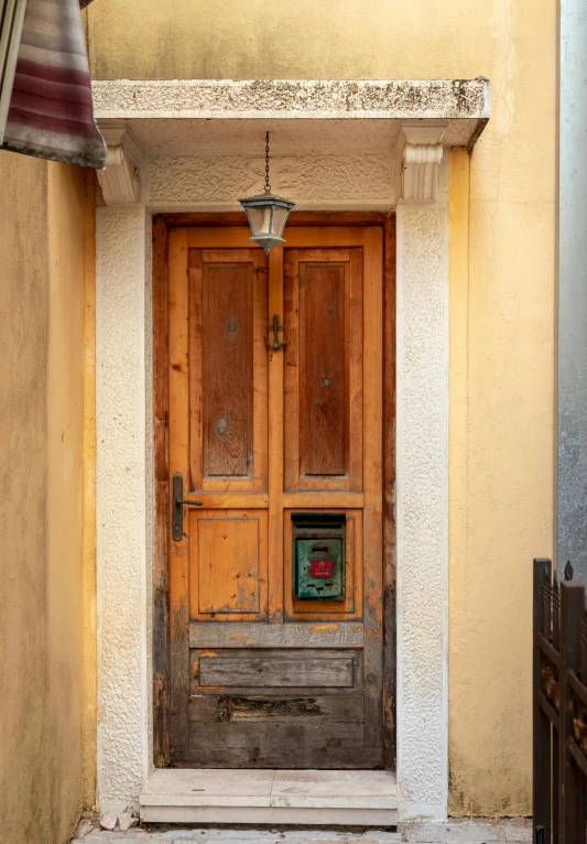 the door has been painted yellow and is open