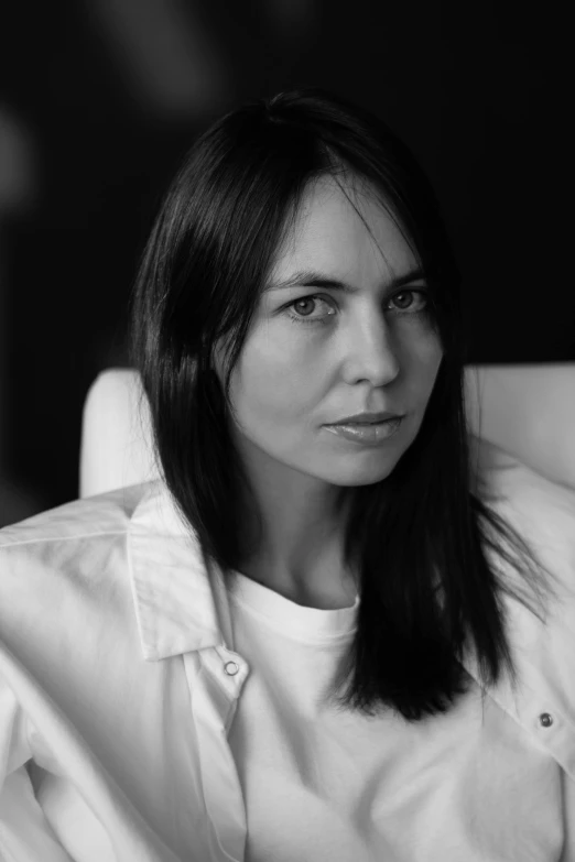 black and white pograph of a woman wearing shirt