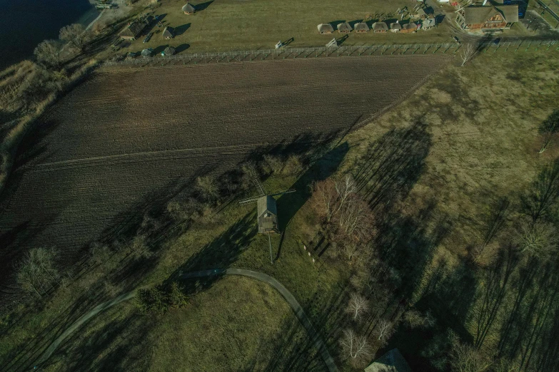 an aerial po of a countryside and road