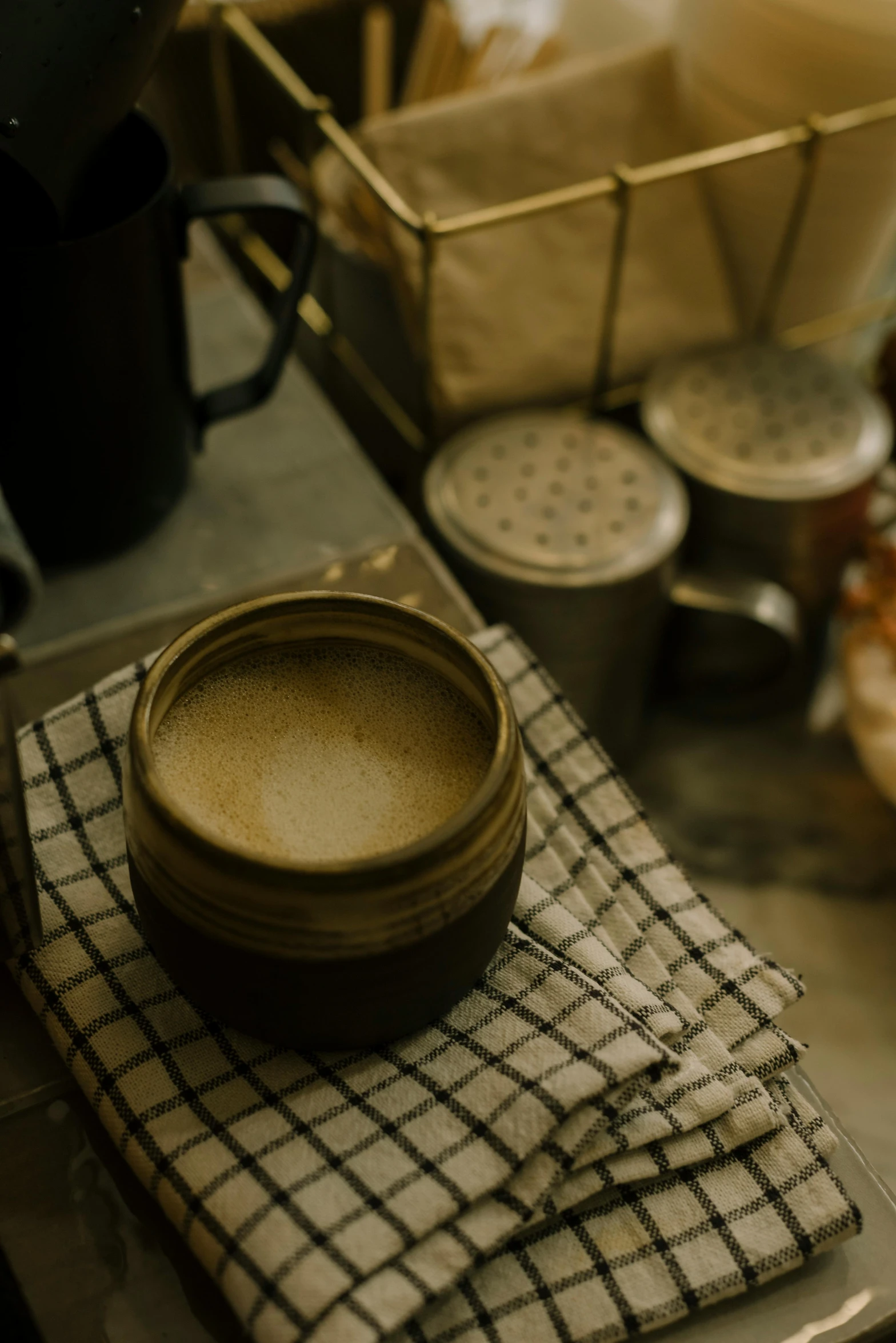 a kitchen scene with a bowl on the napkin