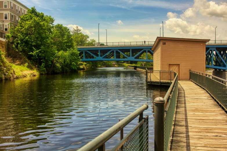 there is a view of a bridge and water from the shore