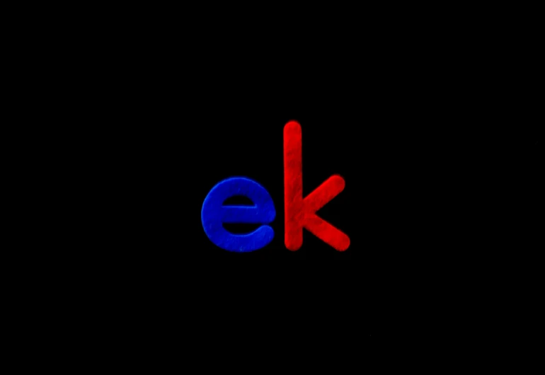 a blue and red letters with black background
