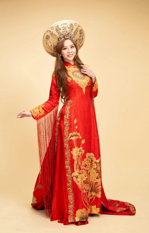 young woman wearing an oriental dress and hat