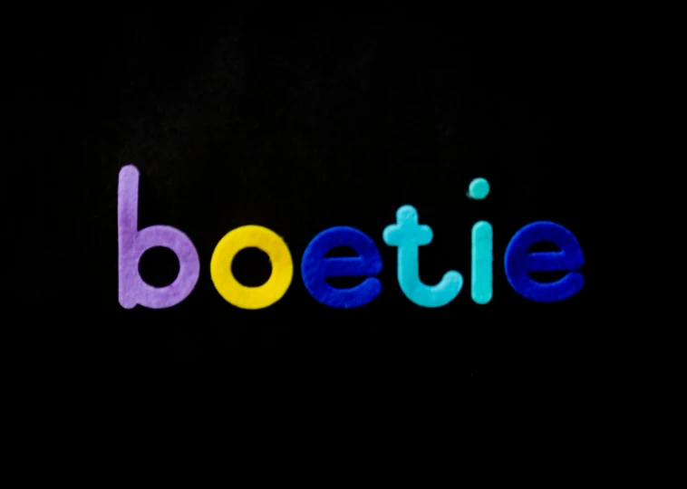 the word boogie made of colored crepe paper