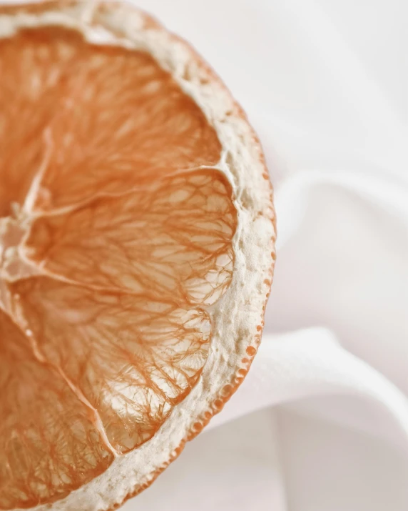 a close up of a single orange slice