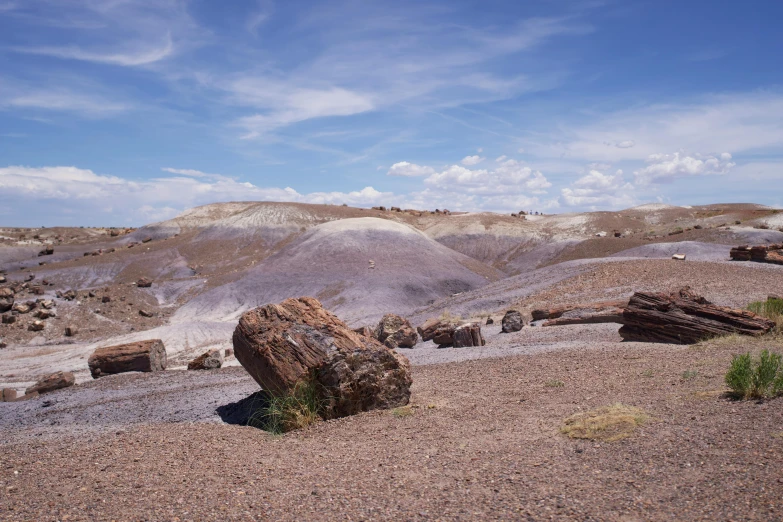 several rocks are on top of some large mounds