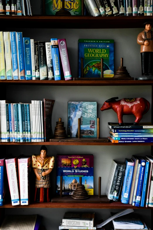 a bookshelf filled with lots of different types of books