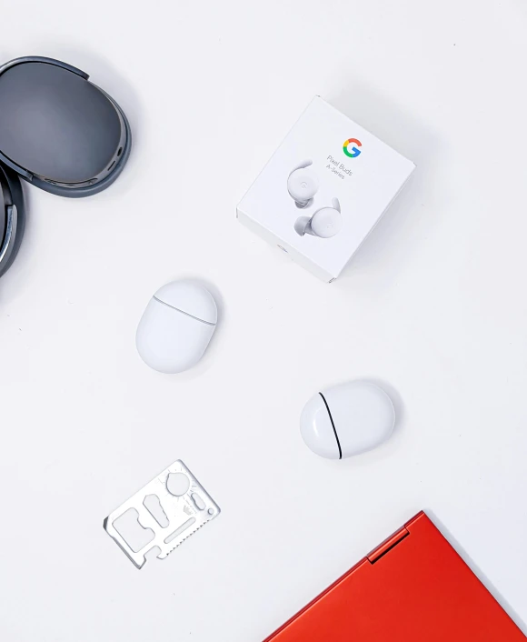 a pair of glasses and mouse next to an open google logo