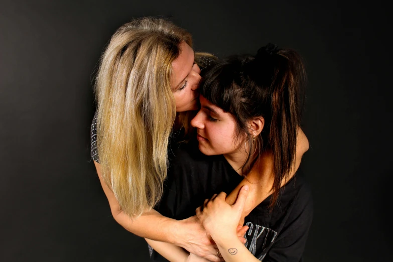 two girls emcing and posing for the camera