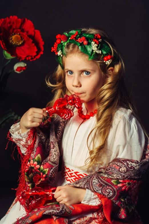 a  in traditional russian garb holding an object