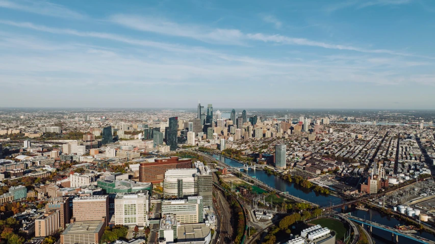 an aerial po of an urban city on a clear day