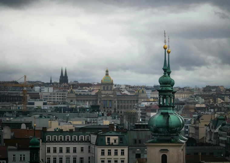 the roofs and spires of several buildings in europe