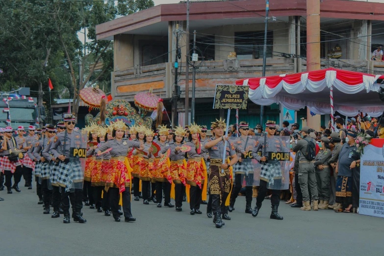 a large group of people standing next to each other