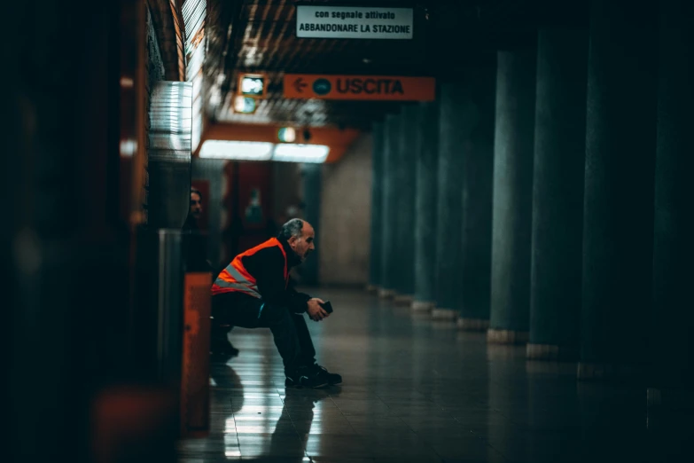 a person standing in the middle of an airport