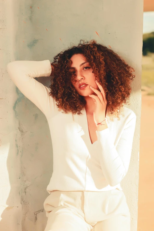 a close up of a person with a afro