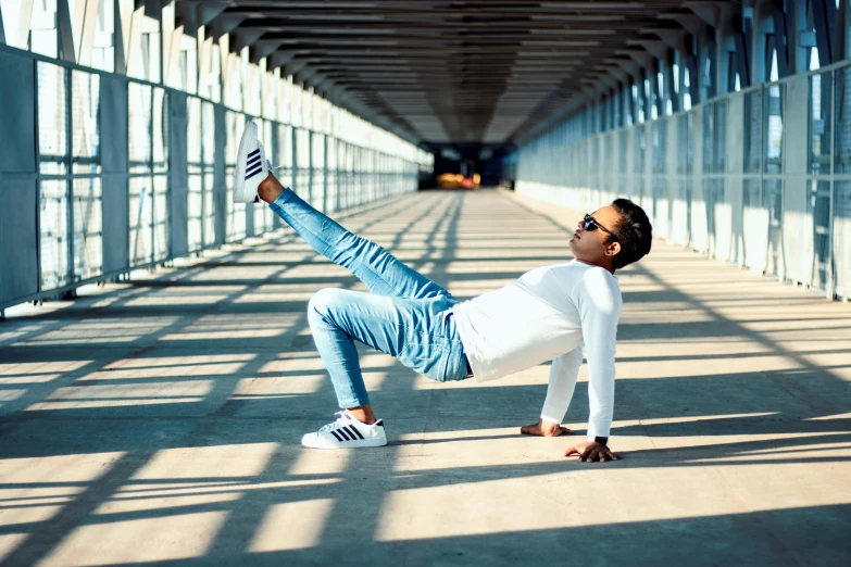 a person stretching their leg up in the air