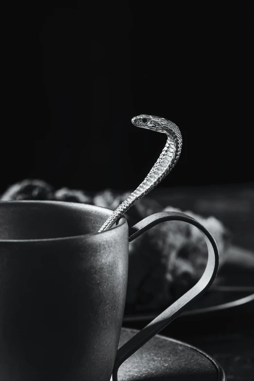 a cup of coffee sitting on top of a saucer