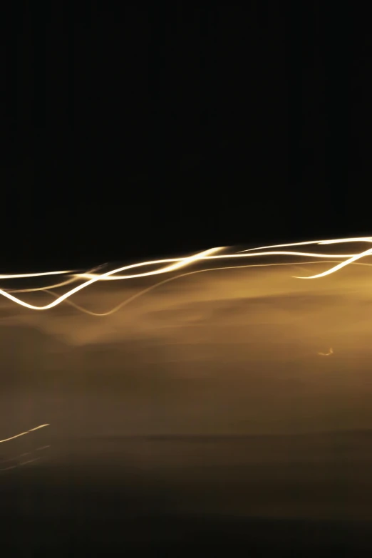 the long exposure pograph shows lines of lights in the sky