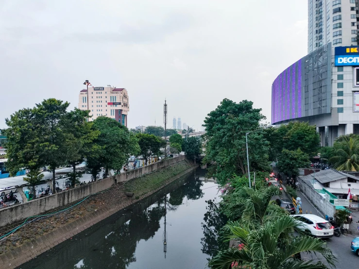 a city view shows buildings near a river