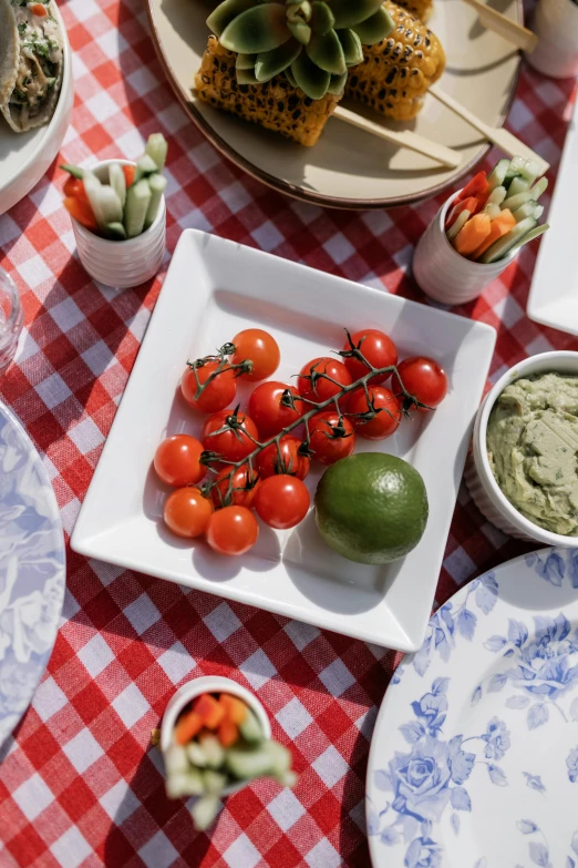 the tomatoes and green olives on this dish are ready for eating