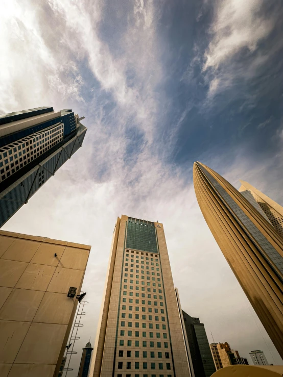 a sky line between two buildings with one building on the left