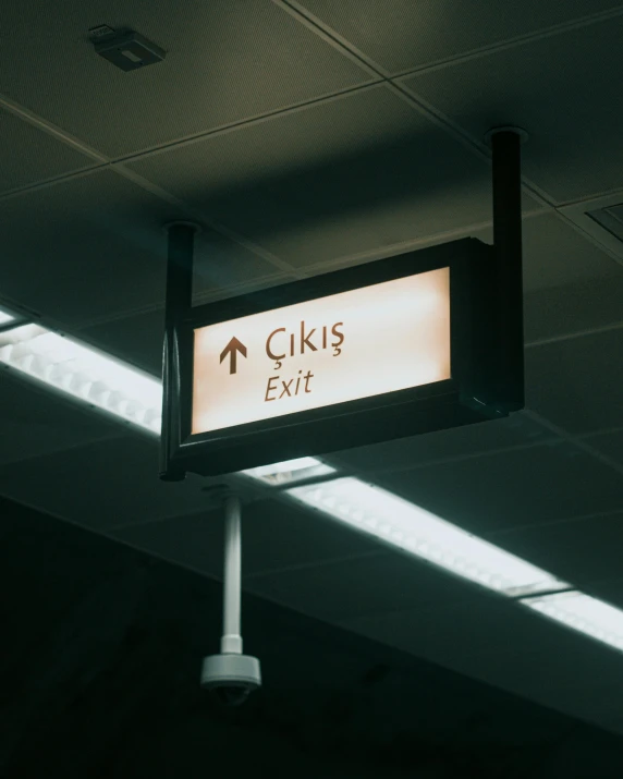 a close up s of a sign for gikis exit