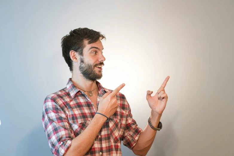 man making the middle finger sign in his right hand