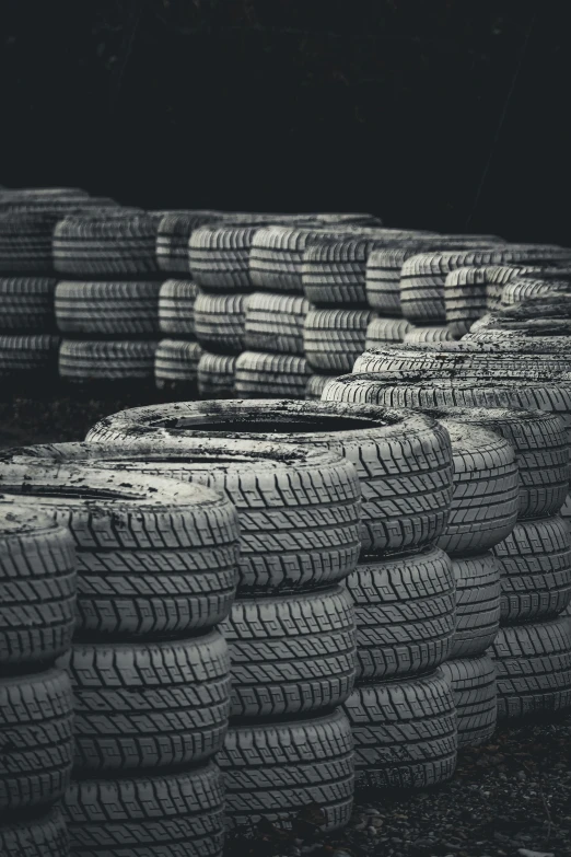 rows of old tires piled next to each other