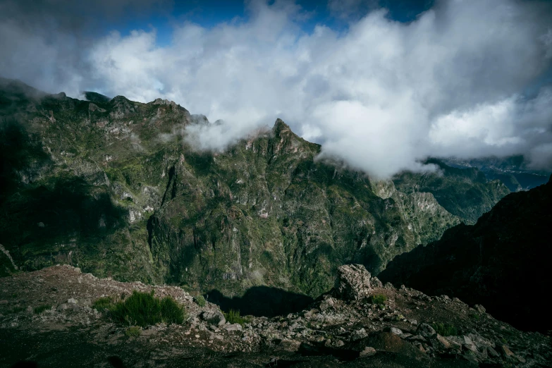 a picture of a mountain range on a cloudy day