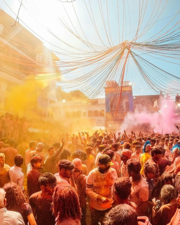 crowd of people in front of an event with smoke bomb on the ground