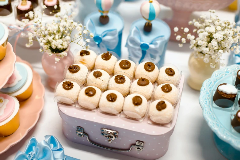 a table filled with lots of small desserts