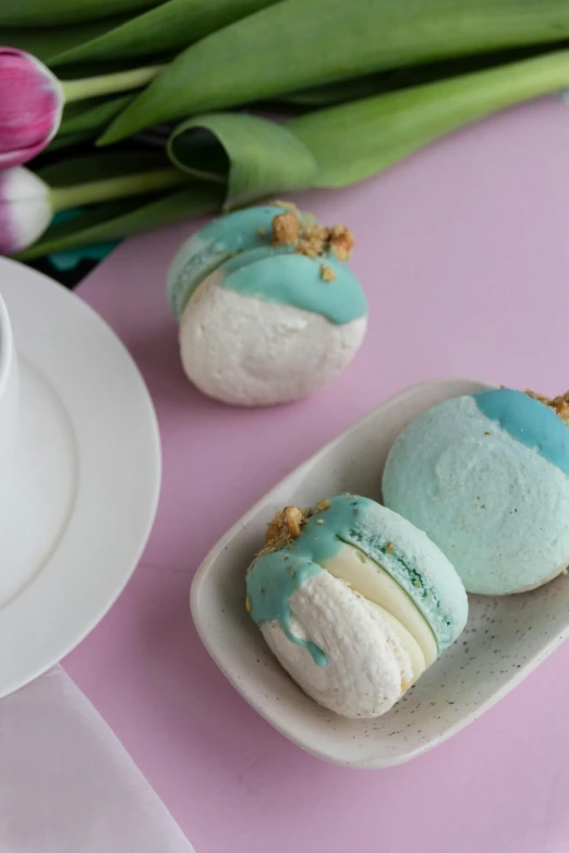 three different colored deserts are on a plate