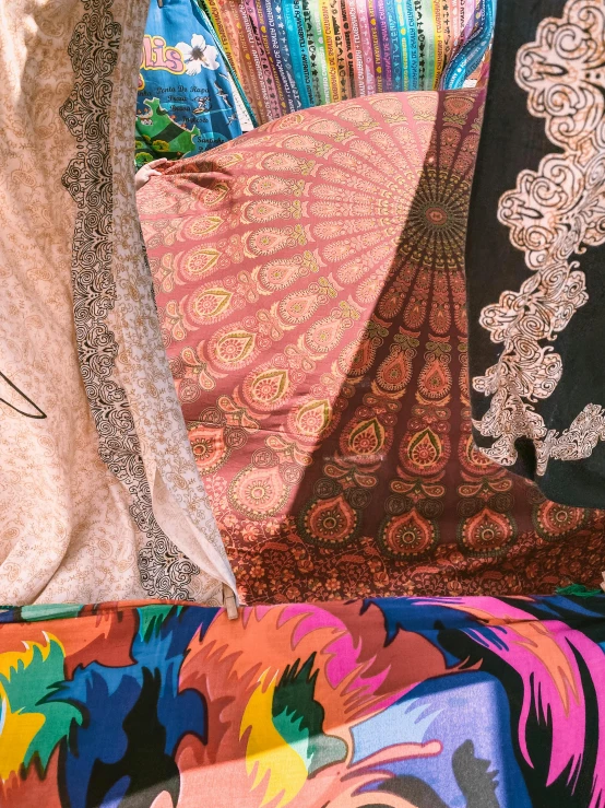 a variety of colorful fabrics that are on display