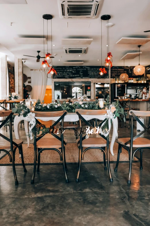 this is an image of a dining room decorated with flowers