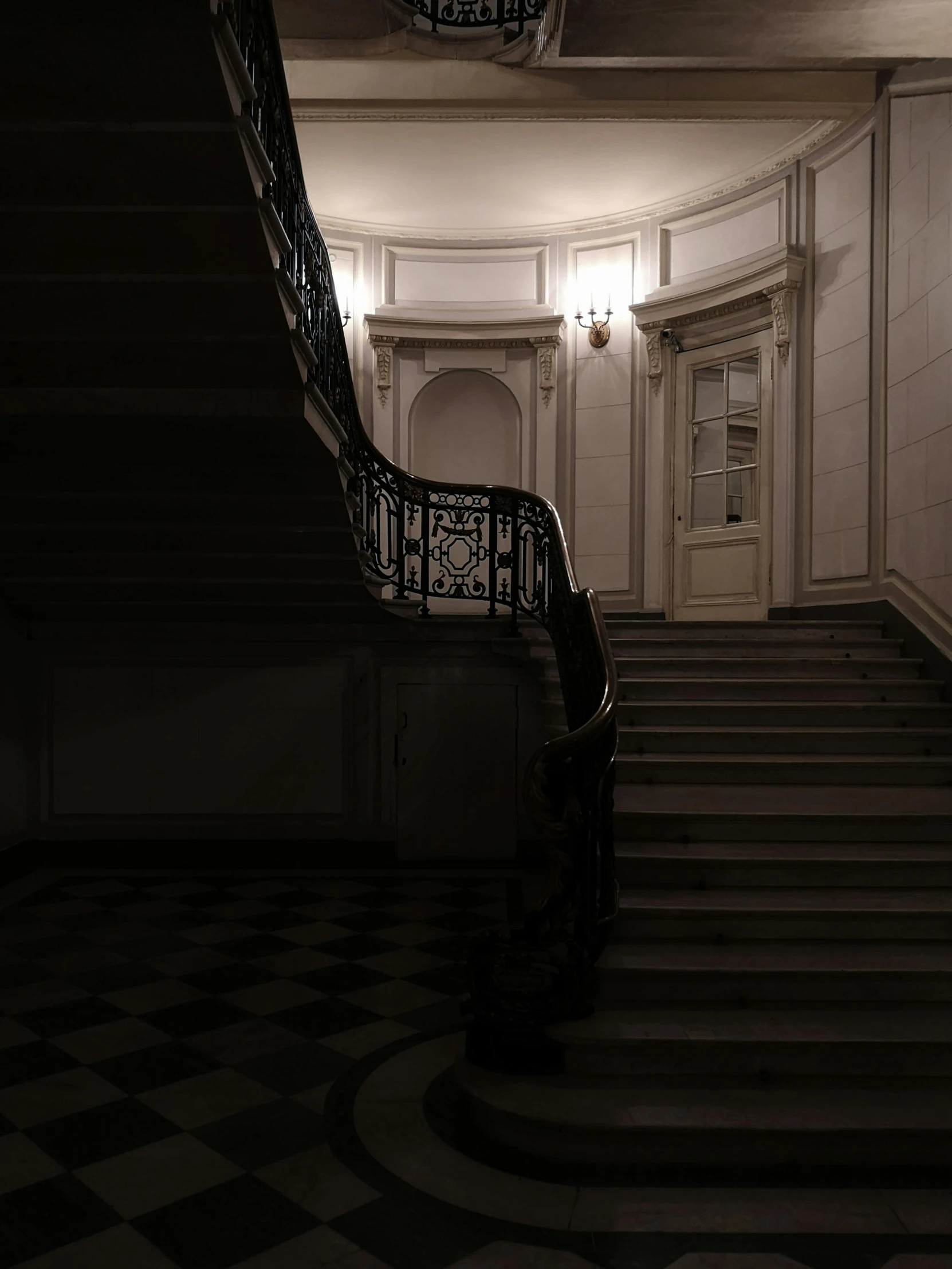 a set of stairs leading to two balconies