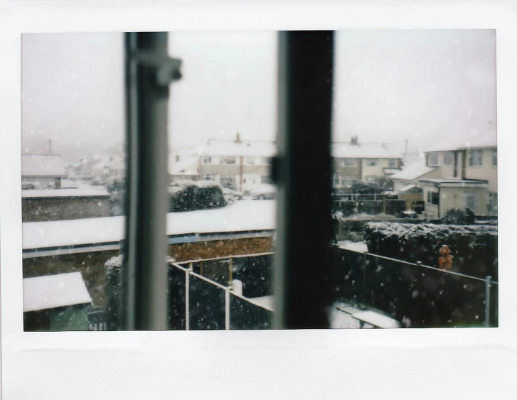 a winter scene of an outside town and the sky