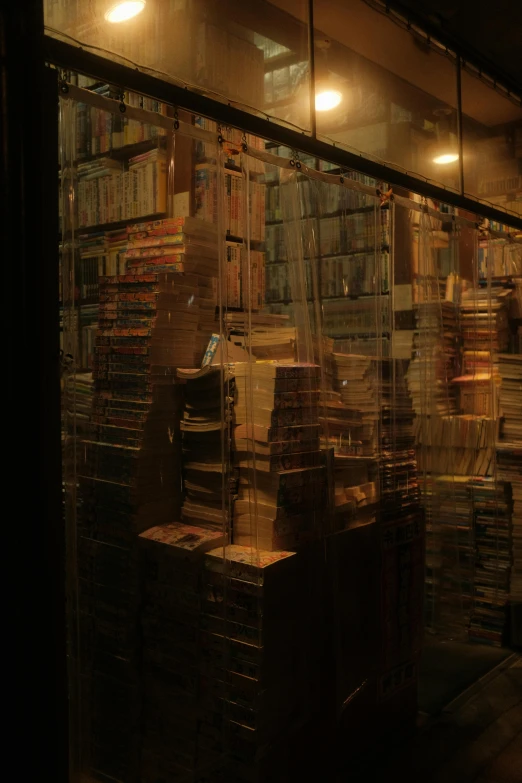 a liry with many books behind it at night