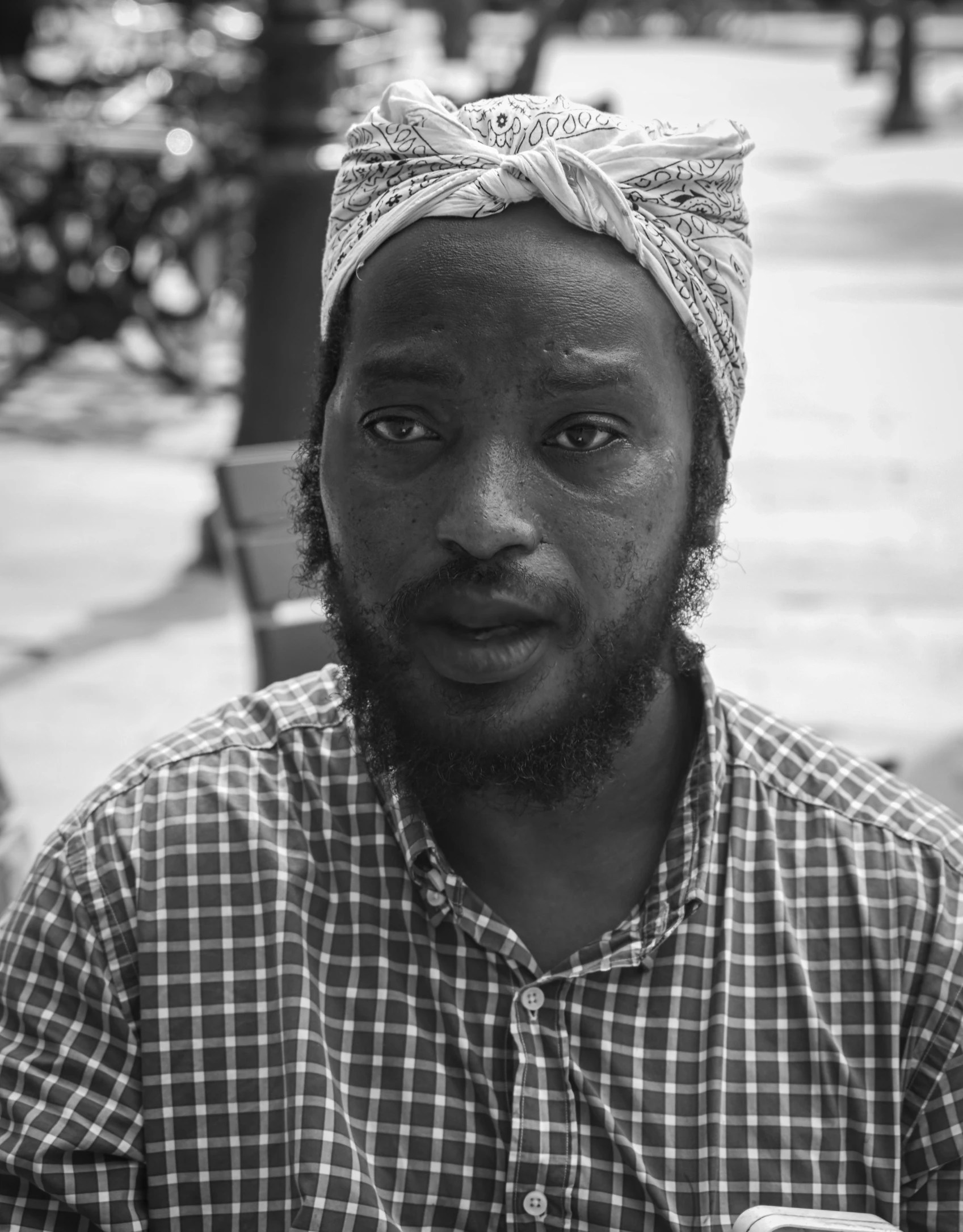 a man wearing a headband sitting down