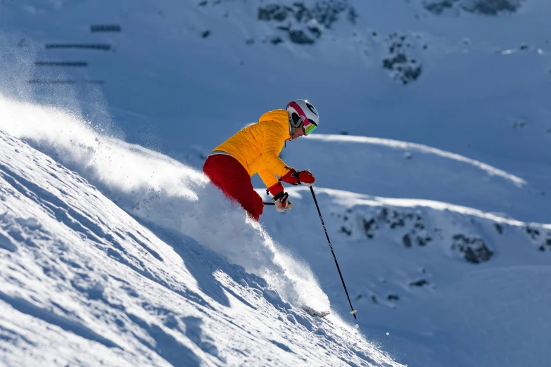 a person with skis on standing on snow