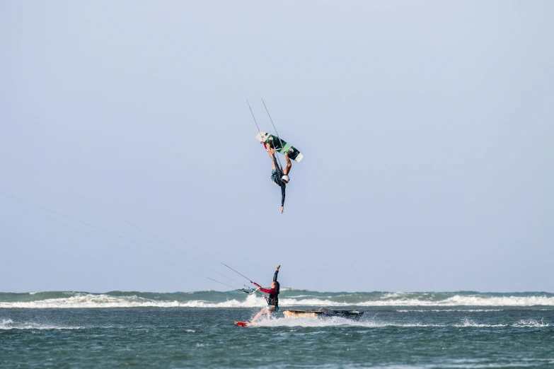 a man kite boarding in the water