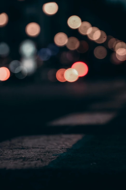 blurred cars and lights in an area with concrete