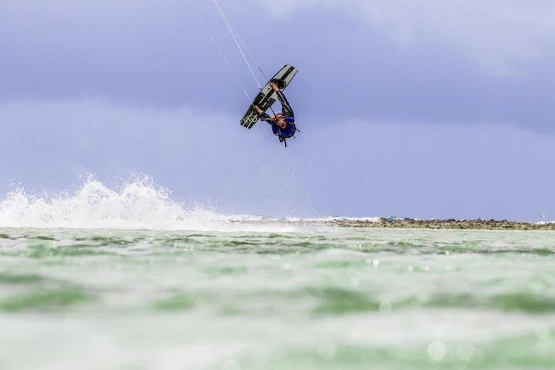 an image of a person doing a hang gliding