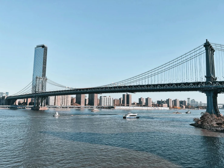 an image of the bridge that goes across a river