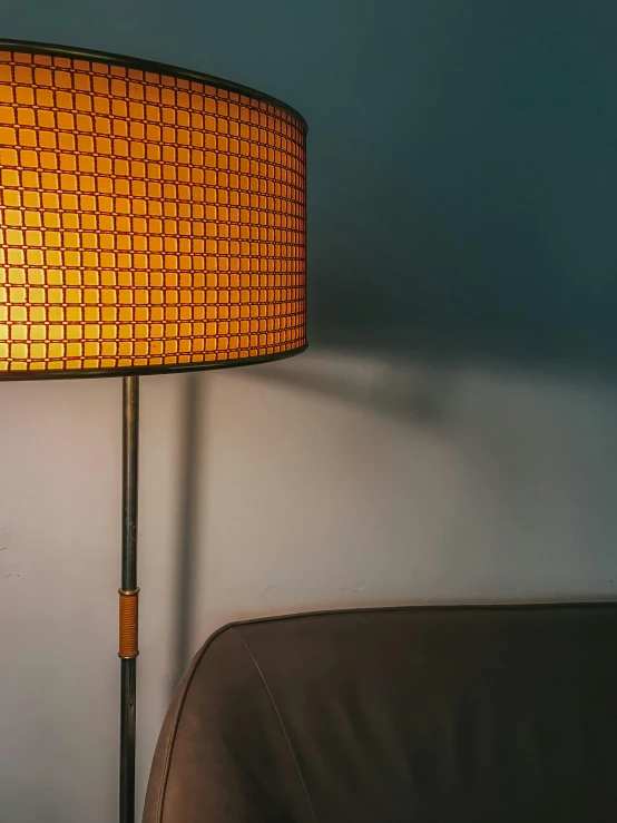 a lamp that is on top of a bed